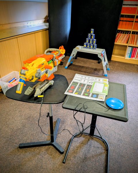 A large Nerf gun controlled by an external switch