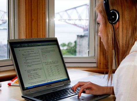 image of a pupil using a laptop